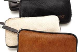 Assortment of cowhide clutch convict bags 