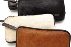 Assortment of cowhide clutch convict bags 