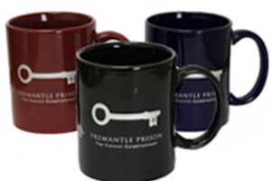 Assortment of Fremantle Prison branded ceramic flare coffee mugs